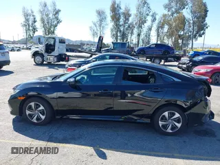 2020 Honda Civic LX z VIN 19XFC2F6XLE212683, wystawiony jako IAAI lot #41745743 z przebiegiem 81 553 mil mil oraz . Historia ofert i sprzedaży dostępna na DreamBid. Obrazek 15.