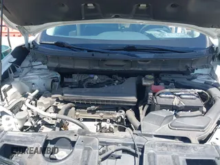2016 Nissan Rogue SV with VIN KNMAT2MV0GP670288, listed as a IAAI auction lot 42202645 with 211,454 mi miles. Bid and sale history available at carsss.com. Image 10.