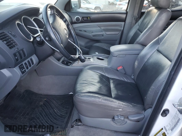 2008 Toyota Tacoma PreRunner with VIN 3TMKU72N98M015653, listed as a Copart auction lot 41821325 with 221,568 mi miles and Salvage title. Bid and sale history available at DreamBid. Image 7.