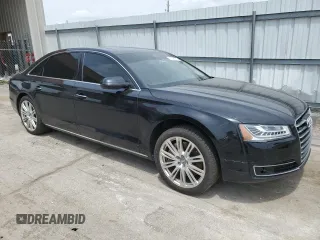 2015 Audi A8 4.0T z VIN WAU32AFD8FN001493, wystawiony jako Copart lot #57394315 z przebiegiem 120 464 mil mil oraz Szkoda całkowita • Salvage title. Historia ofert i sprzedaży dostępna na DreamBid. Obrazek 4.