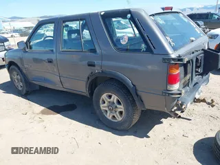 1997 Honda Passport z VIN 4S6CM58V4V4417753, wystawiony jako IAAI lot #42076610 z przebiegiem 211 410 mil mil oraz . Historia ofert i sprzedaży dostępna na DreamBid. Obrazek 3.