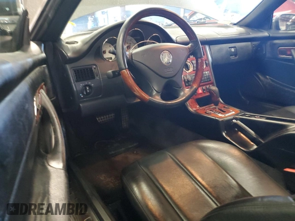 2003 Mercedes-Benz SLK 320 with VIN WDBKK65F83F280656, listed as a Copart auction lot 79158954 with 99,413 mi miles and Salvage title. Bid and sale history available at DreamBid. Image 8.