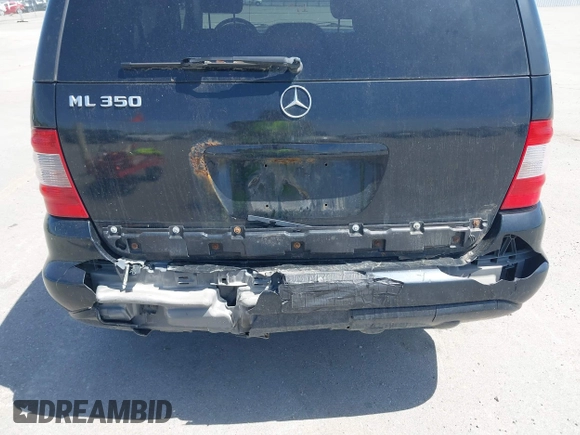 2004 Mercedes-Benz M 350 with VIN 4JGAB57E64A506988, listed as a IAAI auction lot 42219772 with 294,505 mi miles and . Bid and sale history available at DreamBid. Image 6.