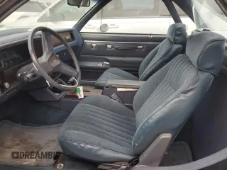 1984 Chevrolet El Camino z VIN 1GCCW80H7ER173291, wystawiony jako Copart lot #76606244 z przebiegiem Nie podano mil oraz Szkoda całkowita • Salvage title. Historia ofert i sprzedaży dostępna na DreamBid. Obrazek 7.