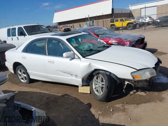 2002 Mazda Millenia S with VIN JM1TA222821725749, listed as a IAAI auction lot 41662948 with 165,088 mi miles and . Bid and sale history available at DreamBid. Image 13.