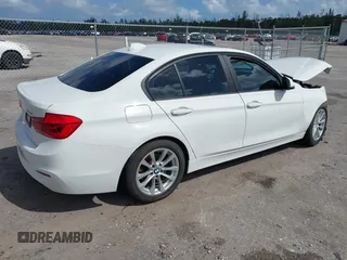 2017 BMW 3 Series 320i with VIN WBA8E1G3XHNU15820, listed as a IAAI auction lot 41972367 with 74,181 mi miles and . Bid and sale history available at carsss.com. Image 4.