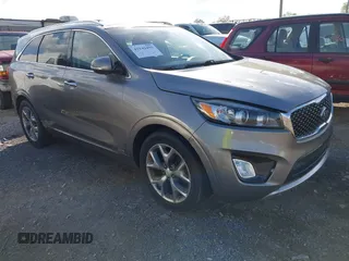 2016 Kia Sorento SX with VIN 5XYPKDA51GG031823, listed as a IAAI auction lot 42142495 with 87,132 mi miles. Bid and sale history available at carsss.com. Image 1.