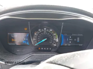 2016 Ford Fusion Titanium with VIN 3FA6P0K93GR223280, listed as a IAAI auction lot 42178478 with 189,239 mi miles and . Bid and sale history available at DreamBid. Image 7.