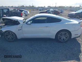 2015 Ford Mustang EcoBoost with VIN 1FA6P8TH8F5306709, listed as a IAAI auction lot 41880999 with 89,492 mi miles and . Bid and sale history available at carsss.com. Image 14.