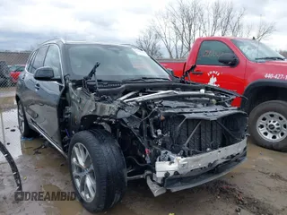 2023 BMW X5 xDrive40i with VIN 5UXCR6C01P9R91795, listed as a IAAI auction lot 41838232 with 30,741 mi miles. Bid and sale history available at carsss.com. Image 1.