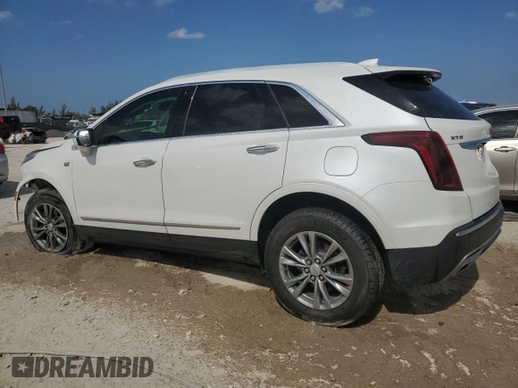 2021 Cadillac XT5 FWD Premium Luxury z VIN 1GYKNCRS7MZ115531, wystawiony jako Copart lot #53611095 z przebiegiem 34 931 mil mil oraz Szkoda całkowita • Salvage title. Historia ofert i sprzedaży dostępna na DreamBid. Obrazek 2.