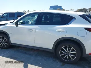 2018 Mazda CX-5 Grand Touring with VIN JM3KFADM8J0373368, listed as a IAAI auction lot 42013535 with 63,142 mi miles and . Bid and sale history available at DreamBid. Image 14.