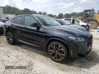 2022 BMW X4 M z VIN 5YM23EC02N9M62773, wystawiony jako Copart lot #53100254 z przebiegiem 9566 mil mil oraz Szkody całkowita. Historia ofert i sprzedaży dostępna na DreamBid. Obrazek 4.