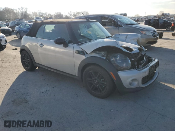 2013 MINI Convertible z VIN WMWZN3C59DT266152, wystawiony jako Copart lot #83379704 z przebiegiem 88 272 mil mil oraz Szkoda całkowita • Salvage title. Historia ofert i sprzedaży dostępna na DreamBid. Obrazek 4.