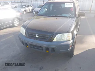 2000 Honda CR-V EX with VIN JHLRD1866YC025833, listed as a IAAI auction lot 42039440 with 238,599 mi miles. Bid and sale history available at carsss.com. Image 6.