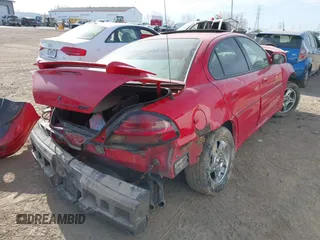 2002 Pontiac Grand Am GT with VIN 1G2NW52E52C174257, listed as a IAAI auction lot 41797928 with 250,020 mi miles. Bid and sale history available at carsss.com. Image 4.
