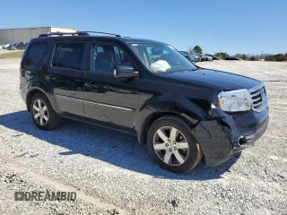 2015 Honda Pilot Touring with VIN 5FNYF4H90FB032551, listed as a Copart auction lot 49572465 with 135,656 mi miles and Salvage Title. Bid and sale history available at DreamBid. Image 4.