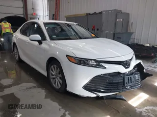 2019 Toyota Camry LE with VIN 4T1B11HK4KU853137, listed as a IAAI auction lot 41633785 with 67,629 mi miles and . Bid and sale history available at DreamBid. Image 1.