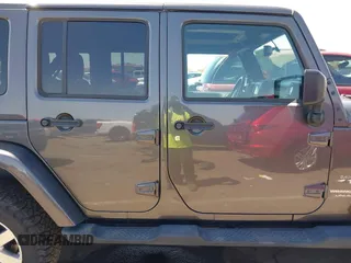 2018 Jeep Wrangler JK Unlimited Altitude with VIN 1C4BJWEG9JL802853, listed as a IAAI auction lot 41993420 with 51,742 mi miles. Bid and sale history available at carsss.com. Image 13.