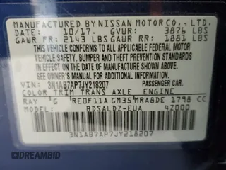 2018 Nissan Sentra SV z VIN 3N1AB7AP7JY218207, wystawiony jako Copart lot #56067335 z przebiegiem 40 733 mil mil oraz Szkoda całkowita • Salvage title. Historia ofert i sprzedaży dostępna na DreamBid. Obrazek 13.