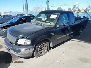 2002 Ford F-150 XL with VIN 1FTRX17WX2NB99454, listed as a IAAI auction lot 41643850 with 180,149 mi miles. Bid and sale history available at carsss.com. Image 17.