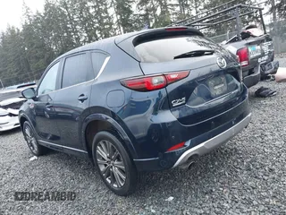 2024 Mazda CX-5 2.5 Turbo Signature with VIN JM3KFBXY6R0421448, listed as a IAAI auction lot 41344699 with 18,738 mi miles. Bid and sale history available at carsss.com. Image 3.