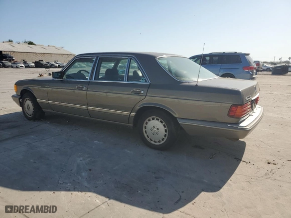 1986 Mercedes-Benz 420 Series 420SEL with VIN WDBCA35D4GA274036, listed as a Copart auction lot 52366565 with 119,277 mi miles and Clean Title. Bid and sale history available at carsss.com. Image 2.