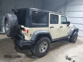 2012 Jeep Wrangler Unlimited Call of Duty MW3 with VIN 1C4BJWFGXCL105130, listed as a Copart auction lot 85747614 with 77,953 mi miles and Salvage title. Bid and sale history available at DreamBid. Image 3.