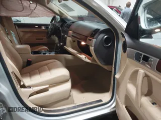 2010 Volkswagen Touareg VR6 with VIN WVGBF7A93AD004398, listed as a IAAI auction lot 41470257 with 108,181 mi miles and . Bid and sale history available at DreamBid. Image 5.