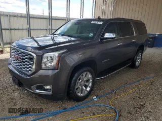 2019 GMC Yukon XL SLT Standard Edition z VIN 1GKS2JKC3KR233809, wystawiony jako Copart lot #56598965 z przebiegiem 109 077 mil mil oraz Czysty tytuł • Clean title. Historia ofert i sprzedaży dostępna na DreamBid. Obrazek 1.