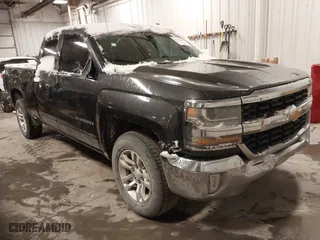 2016 Chevrolet Silverado 1500 LT with VIN 1GCRCREC8GZ137747, listed as a IAAI auction lot 41235393 with 158,487 mi miles. Bid and sale history available at carsss.com. Image 1.