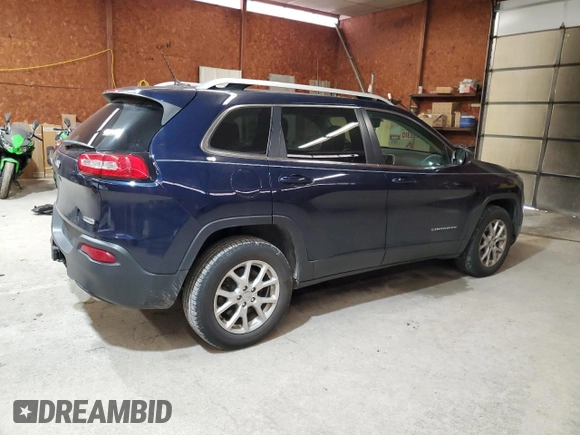 2014 Jeep Cherokee Latitude with VIN 1C4PJMCS7EW227836, listed as a Copart auction lot 52196415 with 94,557 mi miles and Salvage Title. Bid and sale history available at DreamBid. Image 3.