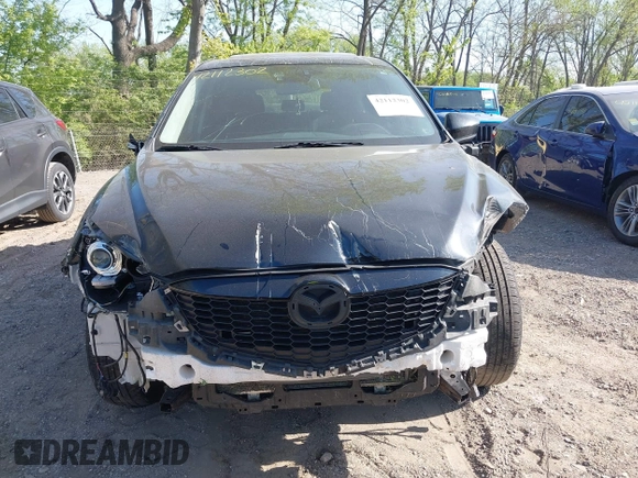 2014 Mazda CX-5 Touring z VIN JM3KE4CY4E0328880, wystawiony jako IAAI lot #42112302 z przebiegiem 185 228 mil mil oraz . Historia ofert i sprzedaży dostępna na DreamBid. Obrazek 13.