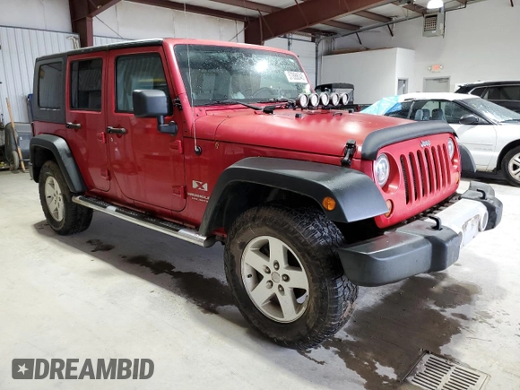 2008 Jeep Wrangler Unlimited X with VIN 1J8GA39128L645762, listed as a Copart auction lot 57888345 with 205,178 mi miles and Salvage title. Bid and sale history available at DreamBid. Image 4.