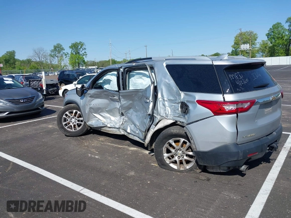 2018 Chevrolet Traverse LT Cloth z VIN 1GNERGKWXJJ167071, wystawiony jako IAAI lot #42019077 z przebiegiem 170 775 mil mil oraz . Historia ofert i sprzedaży dostępna na DreamBid. Obrazek 3.