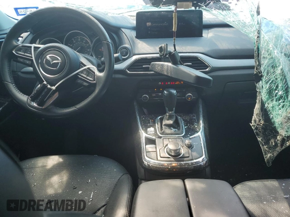 2021 Mazda CX-9 Touring z VIN JM3TCACY5M0500924, wystawiony jako Copart lot #50654505 z przebiegiem 57 067 mil mil oraz Szkoda całkowita • Salvage title. Historia ofert i sprzedaży dostępna na DreamBid. Obrazek 8.