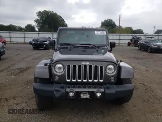 2018 Jeep Wrangler JK Unlimited Sahara with VIN 1C4HJWEG7JL909023, listed as a Copart auction lot 72774404 with 106,801 mi miles and Salvage Title. Bid and sale history available at carsss.com. Image 5.