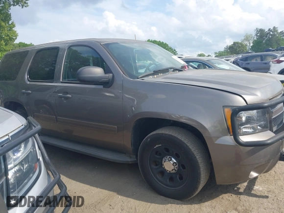2012 Chevrolet Tahoe Commercial with VIN 1GNLC2E07CR187432, listed as a IAAI auction lot 42126539 with 169,607 mi miles and . Bid and sale history available at DreamBid. Image 13.