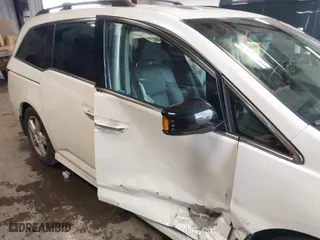 2012 Honda Odyssey Touring with VIN 5FNRL5H96CB134466, listed as a IAAI auction lot 41895655 with 127,672 mi miles. Bid and sale history available at carsss.com. Image 6.