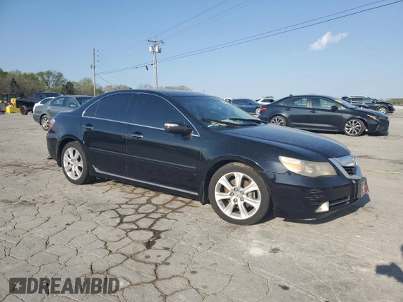 2009 Acura RL Tech Pkg with VIN JH4KB266X9C001760, listed as a Copart auction lot 52303615 with 232,253 mi miles and Salvage Title. Bid and sale history available at carsss.com. Image 4.