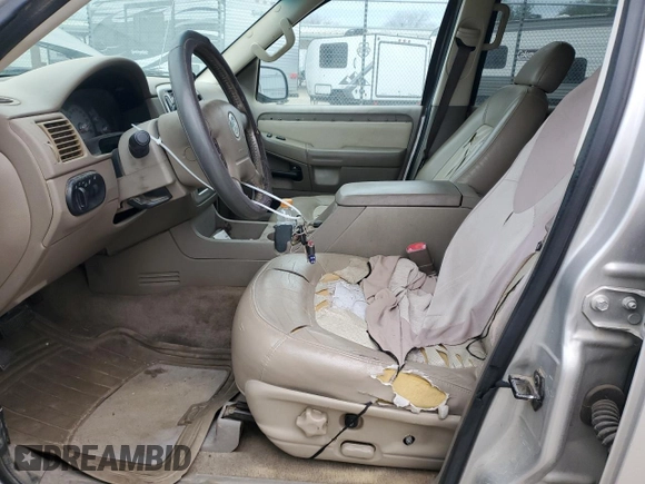2003 Mercury Mountaineer Convenience z VIN 4M2ZU86K93UJ11852, wystawiony jako Copart lot #89218085 z przebiegiem 241 814 mil mil oraz Szkoda całkowita • Salvage title. Historia ofert i sprzedaży dostępna na DreamBid. Obrazek 7.