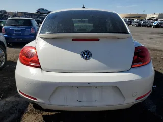 2012 Volkswagen Beetle 2.0T Turbo w/Sun/Snd/Nav PZEV with VIN 3VWVA7AT4CM654695, listed as a Copart auction lot 52117685 with 107,203 mi miles and Clean Title. Bid and sale history available at carsss.com. Image 6.