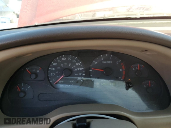2004 Ford Mustang Deluxe with VIN 1FAFP44684F168134, listed as a Copart auction lot 46898385 with 124,391 mi miles and Salvage Title. Bid and sale history available at carsss.com. Image 9.