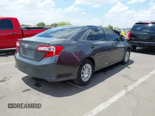 2014 Toyota Camry L with VIN 4T1BF1FK0EU853905, listed as a IAAI auction lot 42217834 with 108,612 mi miles and . Bid and sale history available at DreamBid. Image 4.