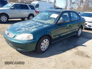 2000 Honda Civic VP with VIN 2HGEJ6615YH579906, listed as a IAAI auction lot 41683779 with 159,701 mi miles. Bid and sale history available at carsss.com. Image 2.