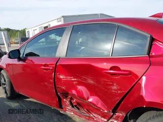 2023 Toyota Corolla SE with VIN 5YFS4MCE8PP167962, listed as a IAAI auction lot 42010518 with 5,648 mi miles and . Bid and sale history available at DreamBid. Image 14.
