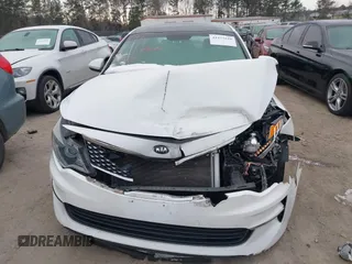 2016 Kia Optima EX with VIN 5XXGU4L30GG086743, listed as a IAAI auction lot 41275516 with 118,699 mi miles. Bid and sale history available at carsss.com. Image 12.