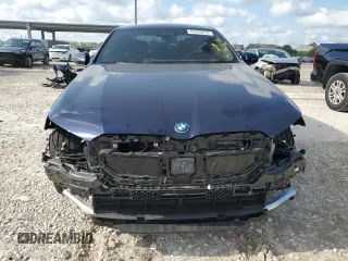 2024 BMW i5 eDrive40 with VIN WBY33FK09RCR50159, listed as a Copart auction lot 55520615 with 12,564 mi miles and Salvage title. Bid and sale history available at DreamBid. Image 5.