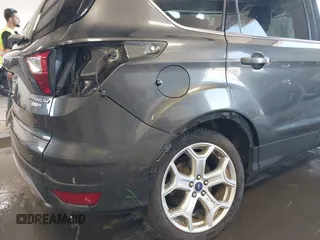 2019 Ford Escape Titanium with VIN 1FMCU9J97KUC55772, listed as a IAAI auction lot 42514001 with 77,737 mi miles and . Bid and sale history available at DreamBid. Image 6.