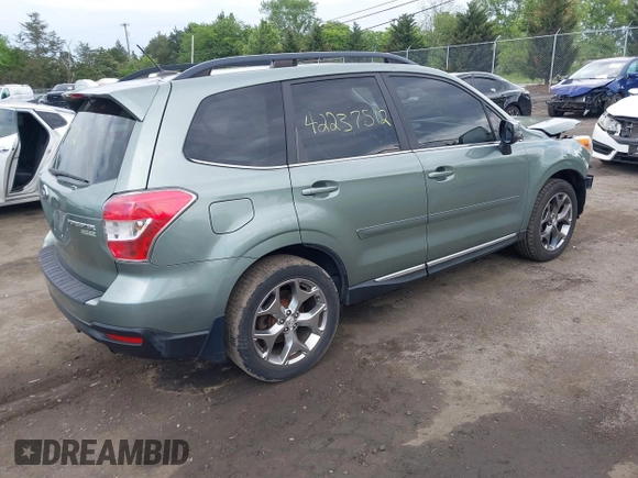 2015 Subaru Forester Touring with VIN JF2SJAWC9FH561581, listed as a IAAI auction lot 42237512 with 109,210 mi miles and . Bid and sale history available at DreamBid. Image 4.